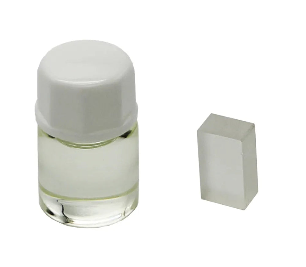 Kalibreringsolja för honungsrefraktometer tillsammans med referensblock