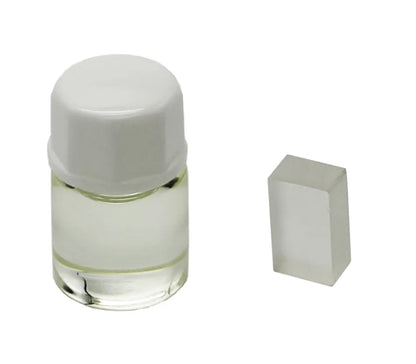 Kalibreringsolja för honungsrefraktometer tillsammans med referensblock